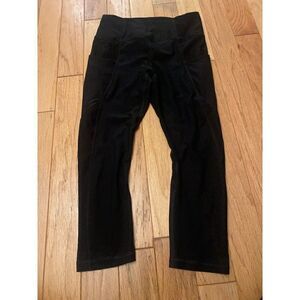 RBX, women's black athletic spandex leggings with side pockets size small